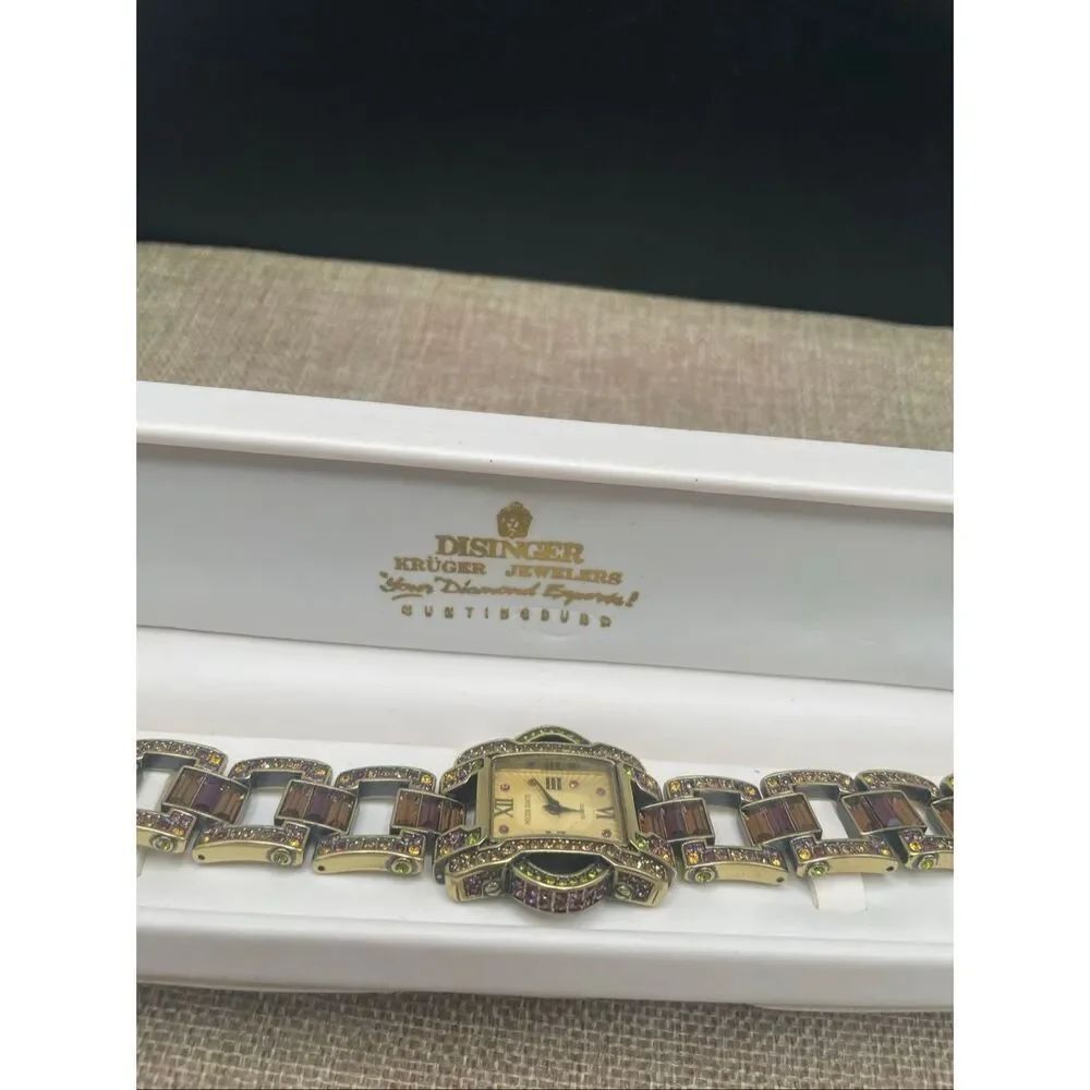 Heidi Daus Crystal Embellished Bracelet Watch – Amethyst Baguettes